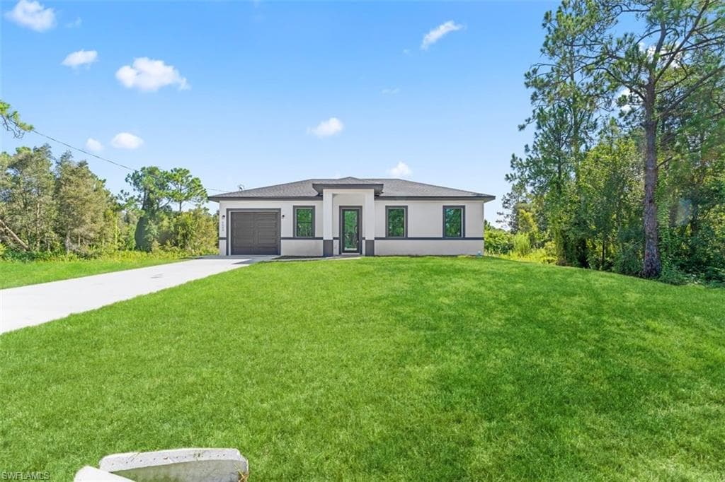 1553 Meadow RD LEHIGH ACRES, FL 33976